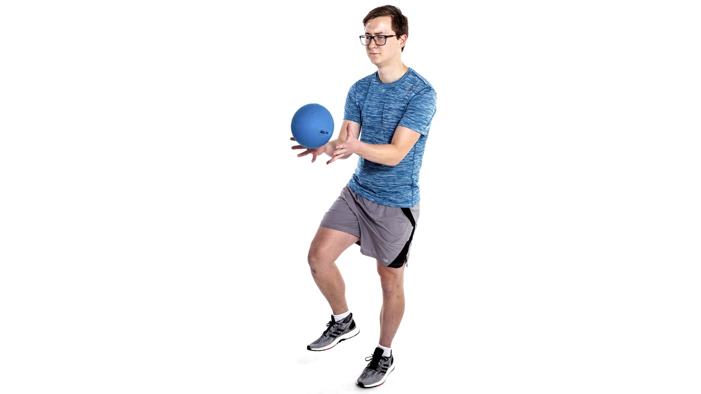 Throw and catch a medicine ball exercise for runners and proprioception