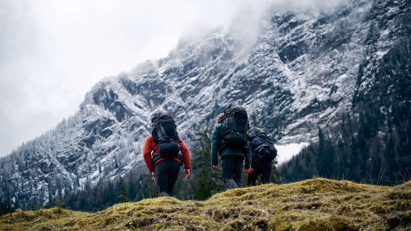 hiking up some turf with jack wolfskin backpacks and jackets