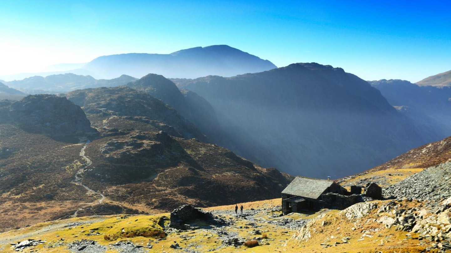 Walkers near Dubs Hut on Fleetwith Pike in the Lake District
