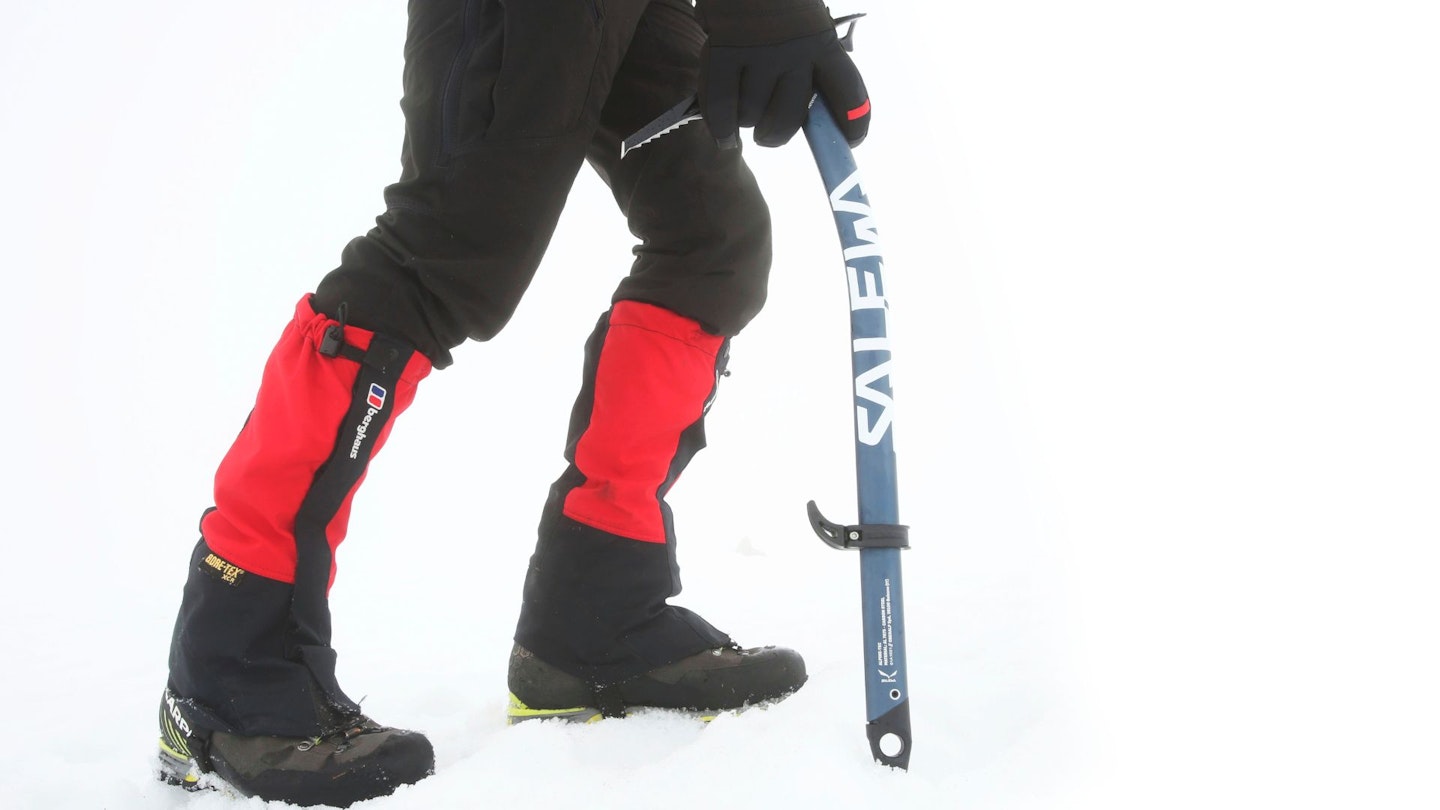 A hiker carrying a Salewa ice axe
