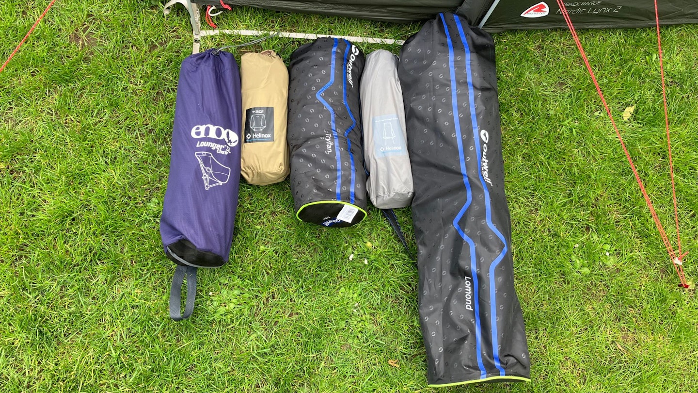 Camping chairs packed away displayed in a row