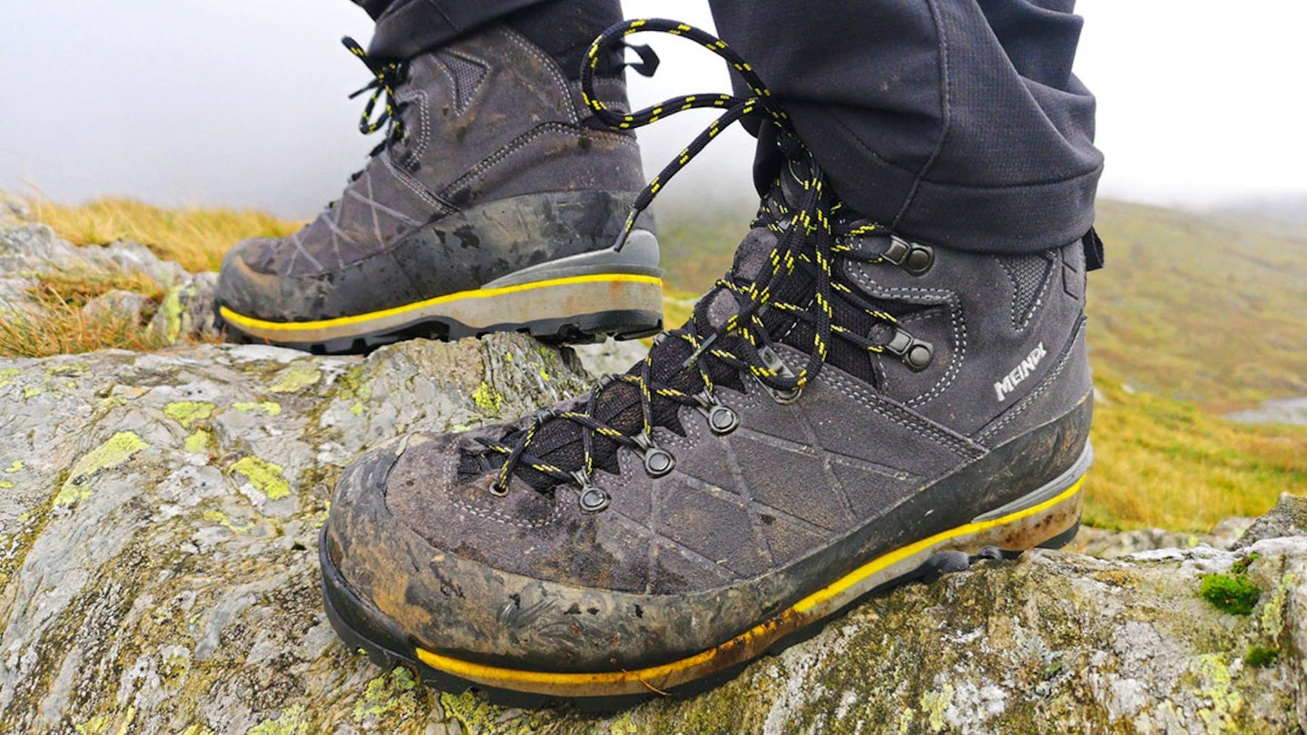 Meindl Antelao Pro GTX on test, standing on a rock
