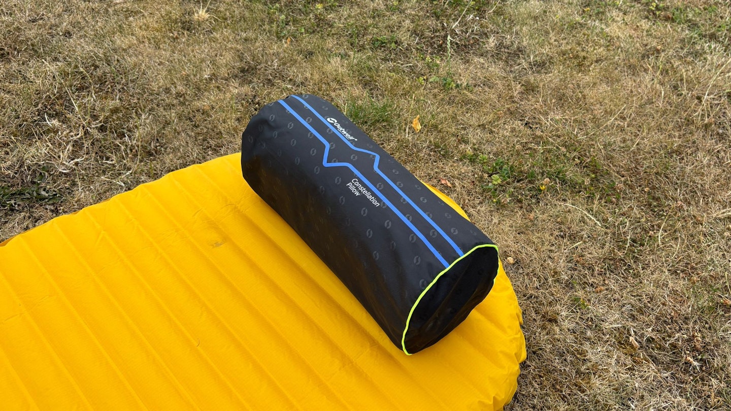 Outwell Constellation Pillow packed away on a sleeping mat