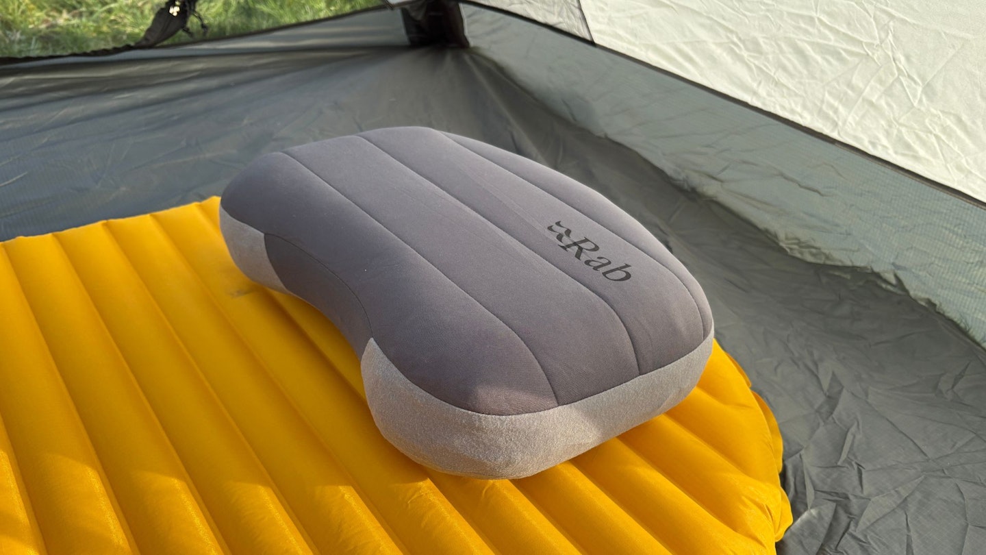 Rab Stratosphere Inflatable Pillow lying ontop of a sleeping mat