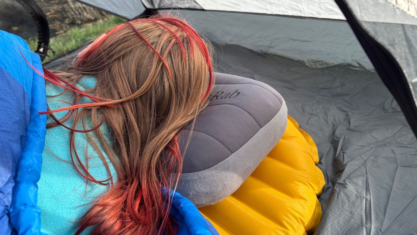 Rab Stratosphere Inflatable Pillow lying ontop of a sleeping mat