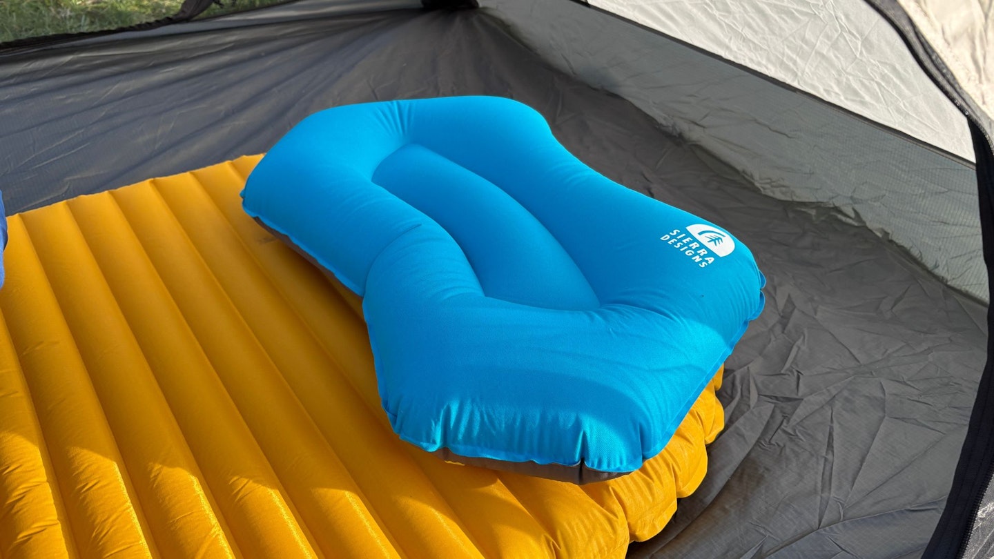 An image of the Sierra Designs Gunnison Pillow in a tent