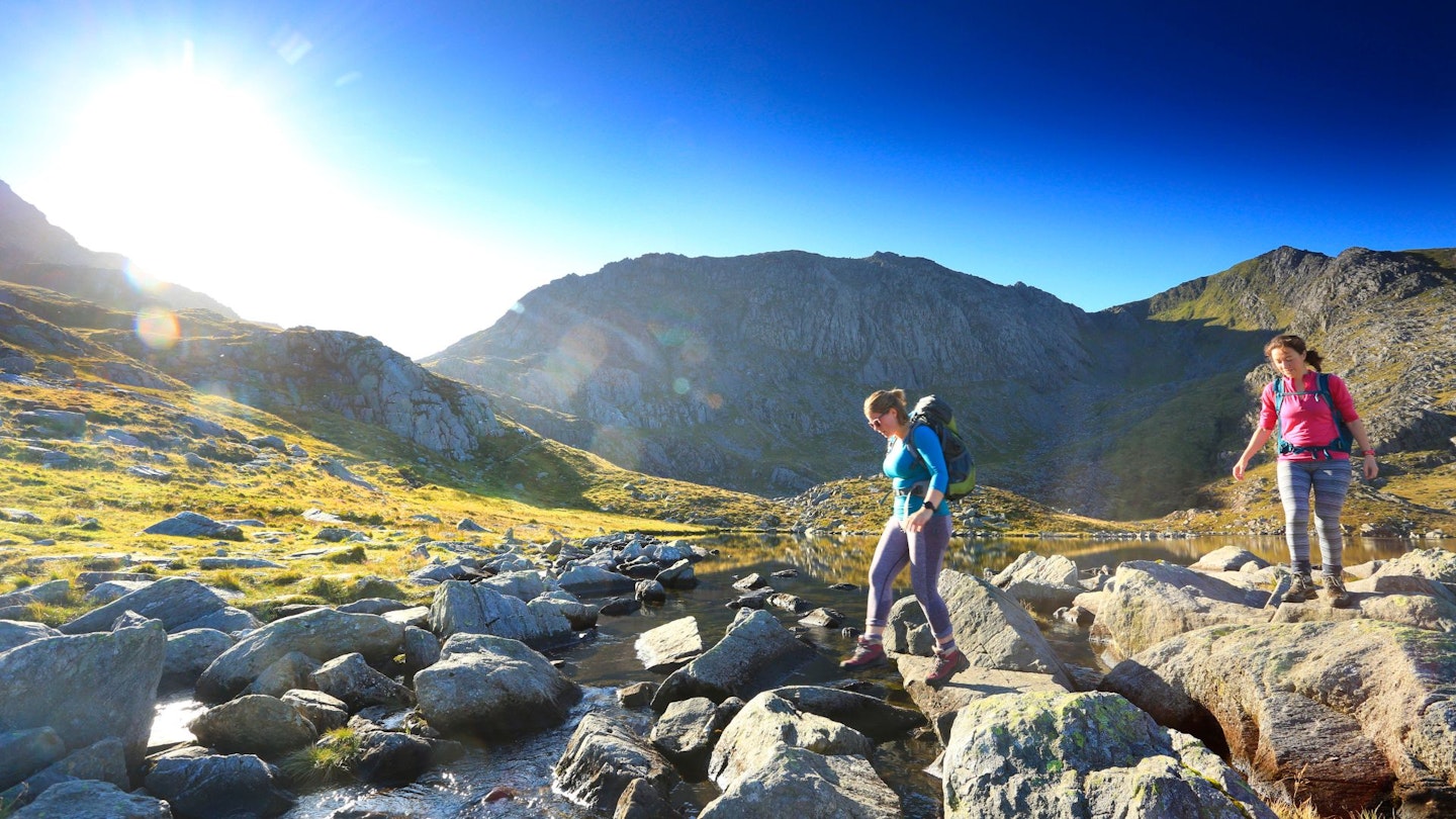 Two female hikers wearing base layers