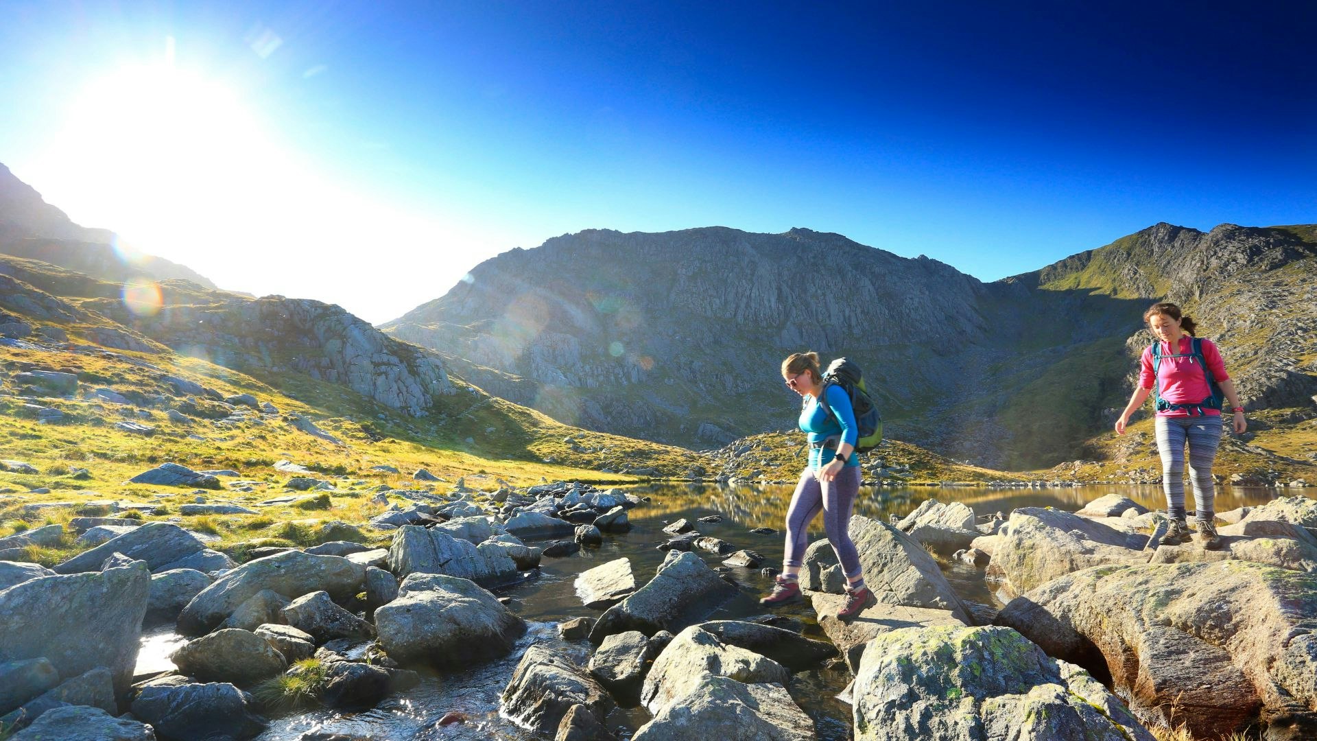 Two female hikers wearing base layers