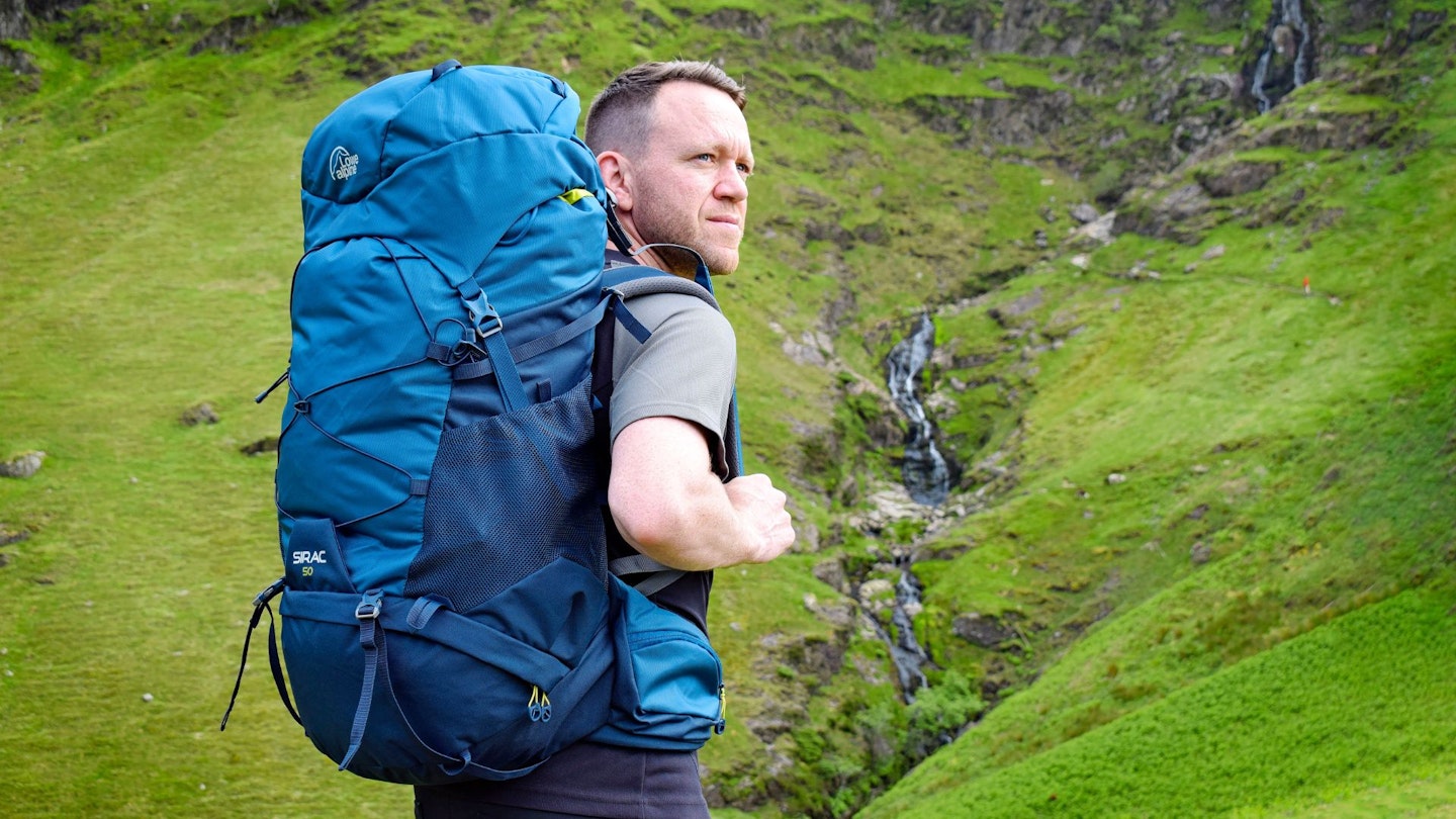 Our gear tester James Forrest wearing a Lowe Alpine Sirac 50L backpacking backpack