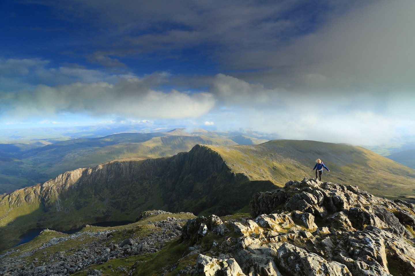 Hiker near the summit of Cadair Idris Penygadair in Snowdonia