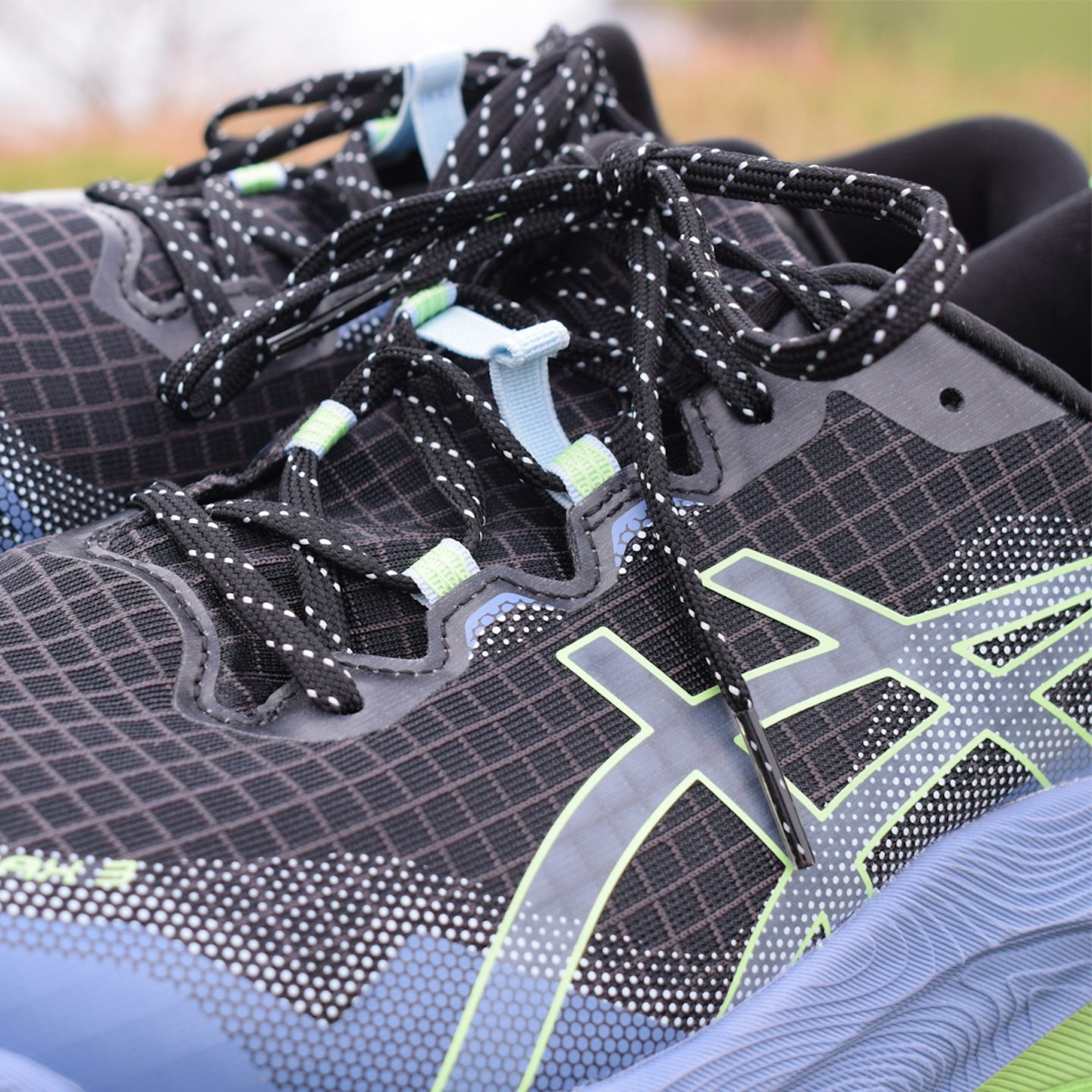 Mesh upper of Asics Trabuco Max 3 trail running shoes square cropped