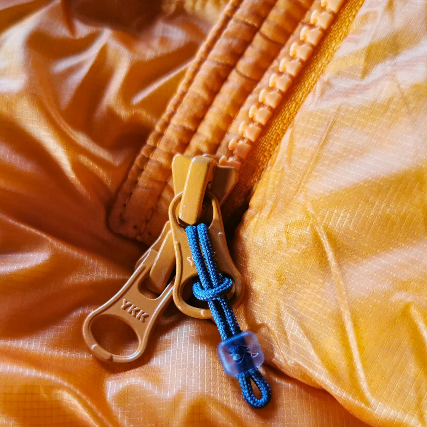Rab Mythic Ultra zip puller