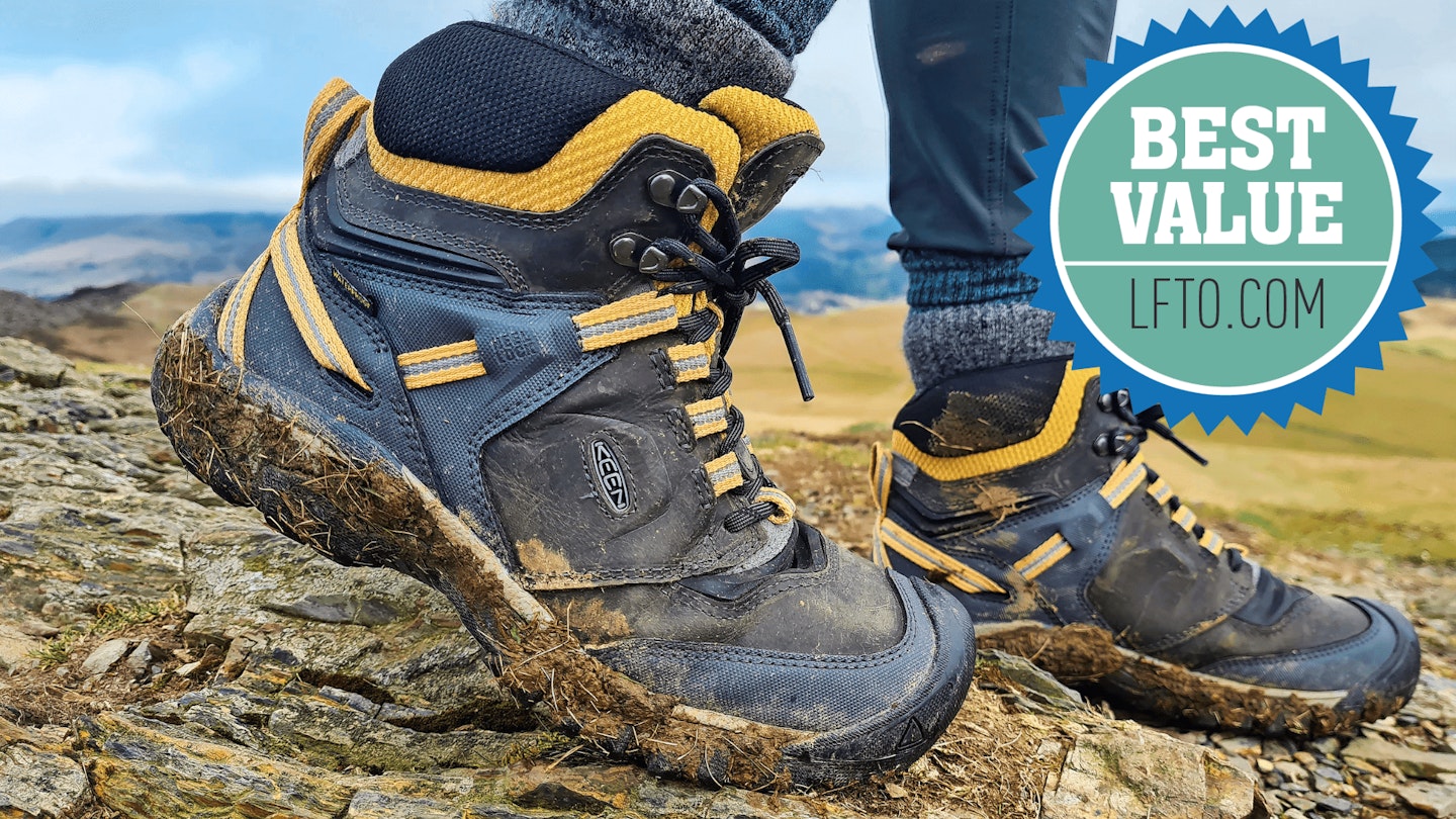 Hiker wearing muddy Keen Ridge Flex