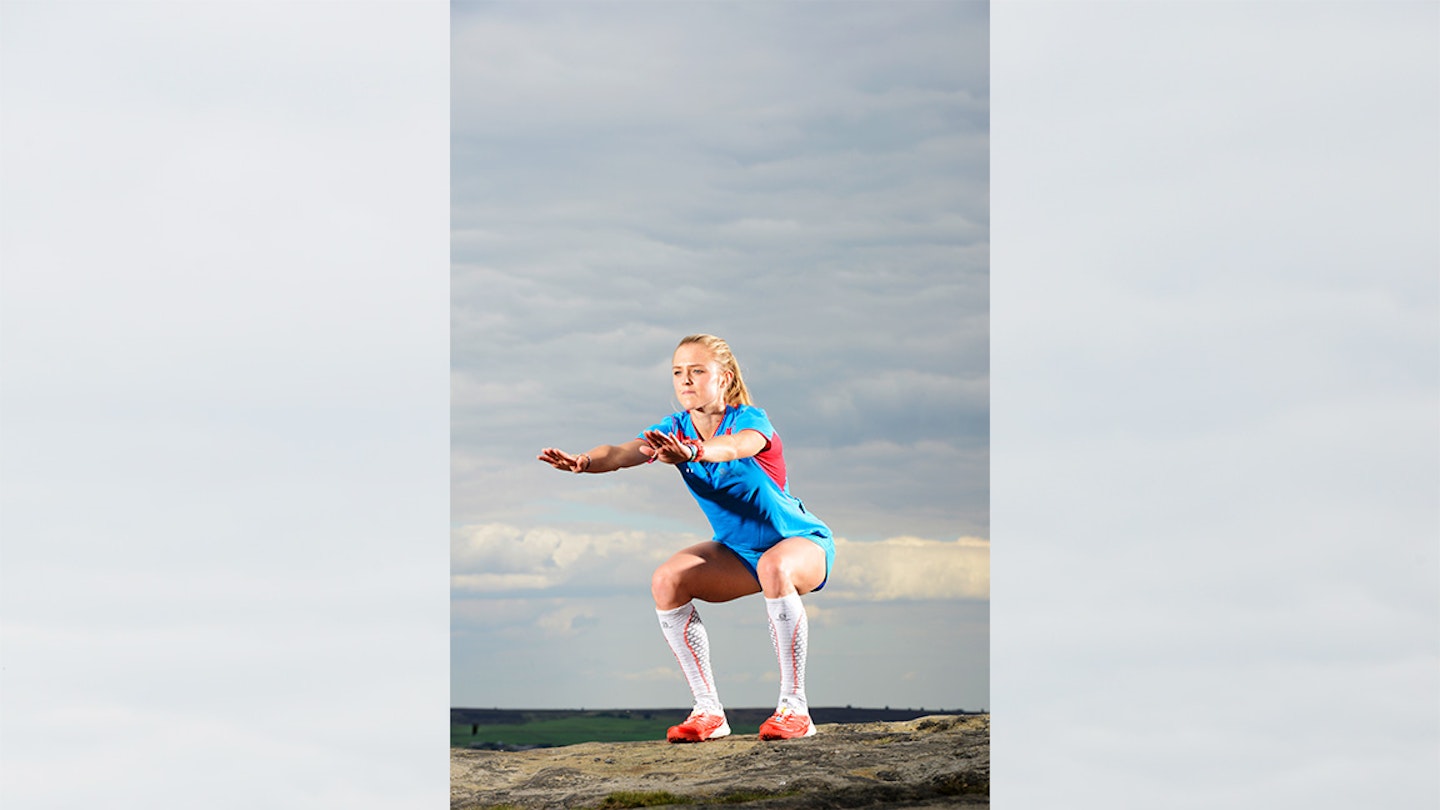 woman doing a squat