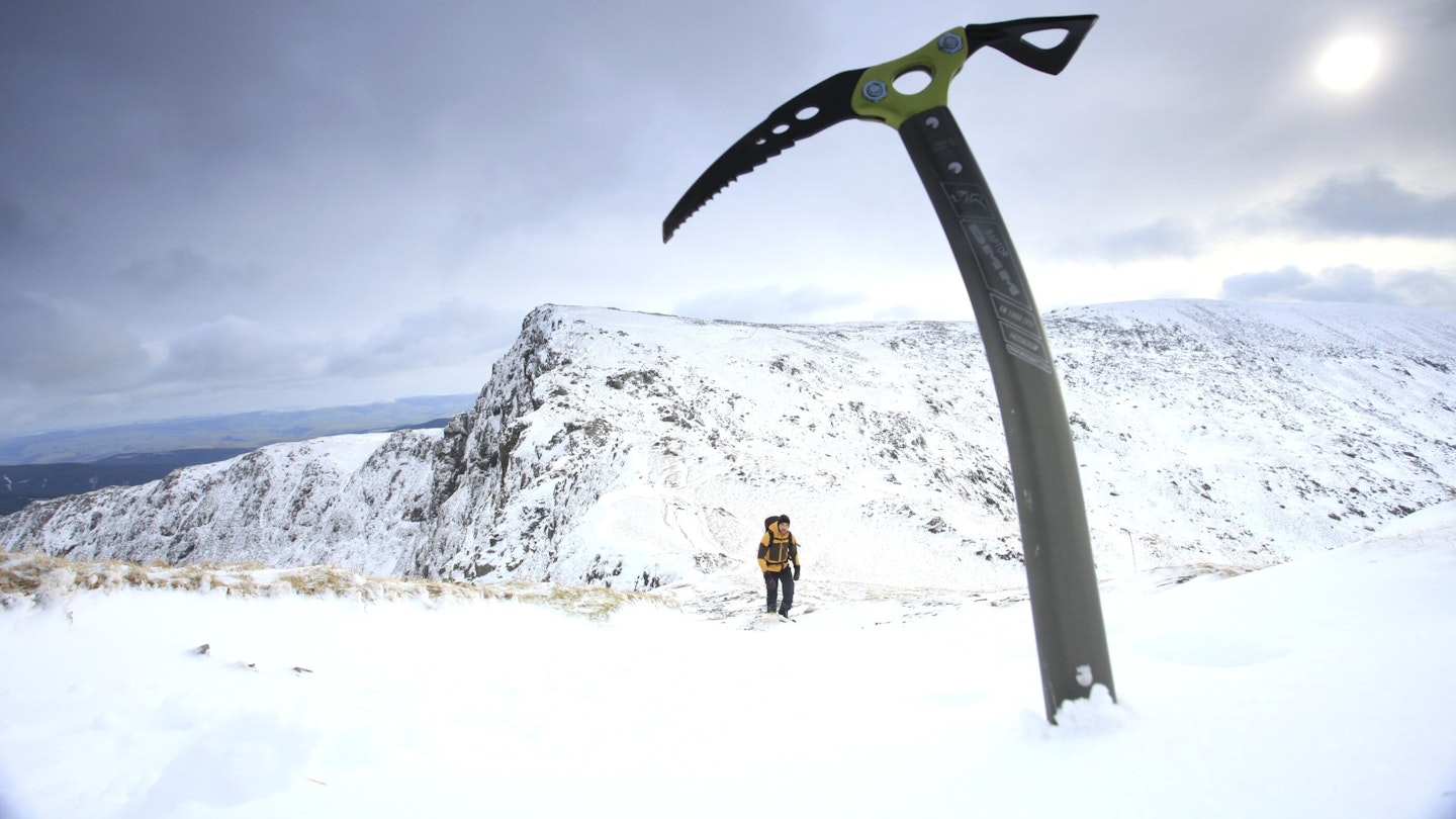 Ice axe in the snow