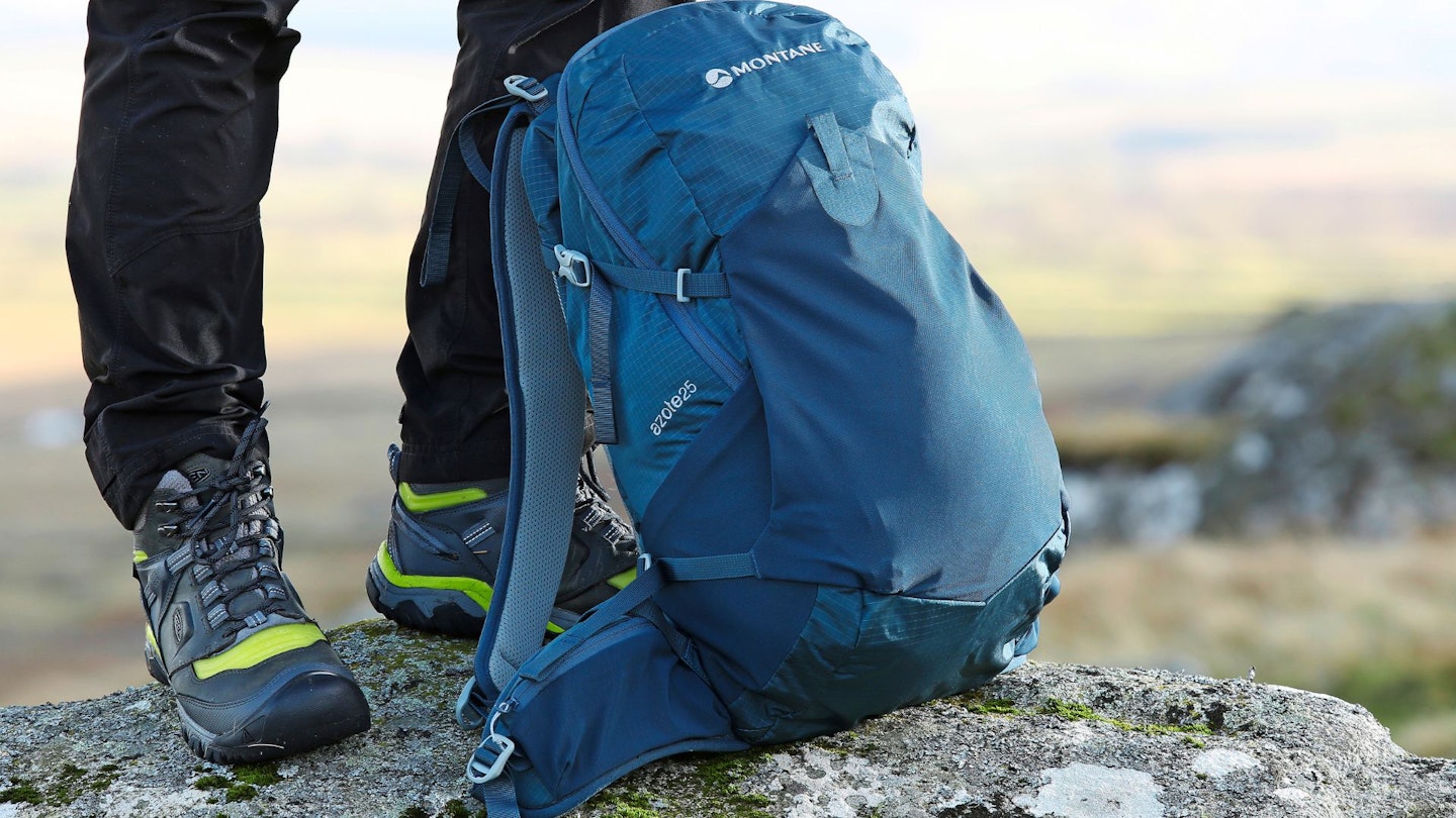 Daypack next to hiker's boots