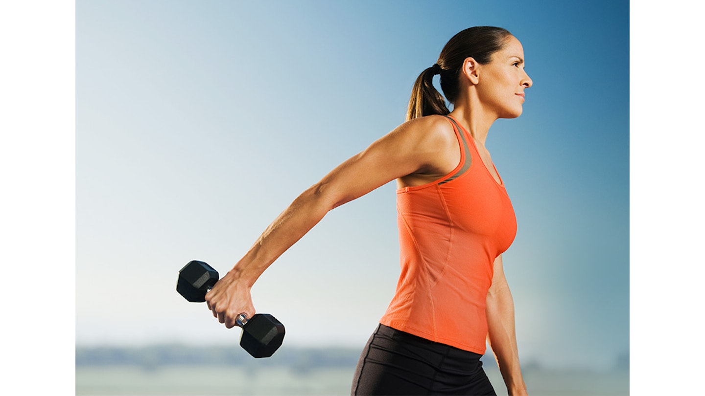 woman with a dumbell