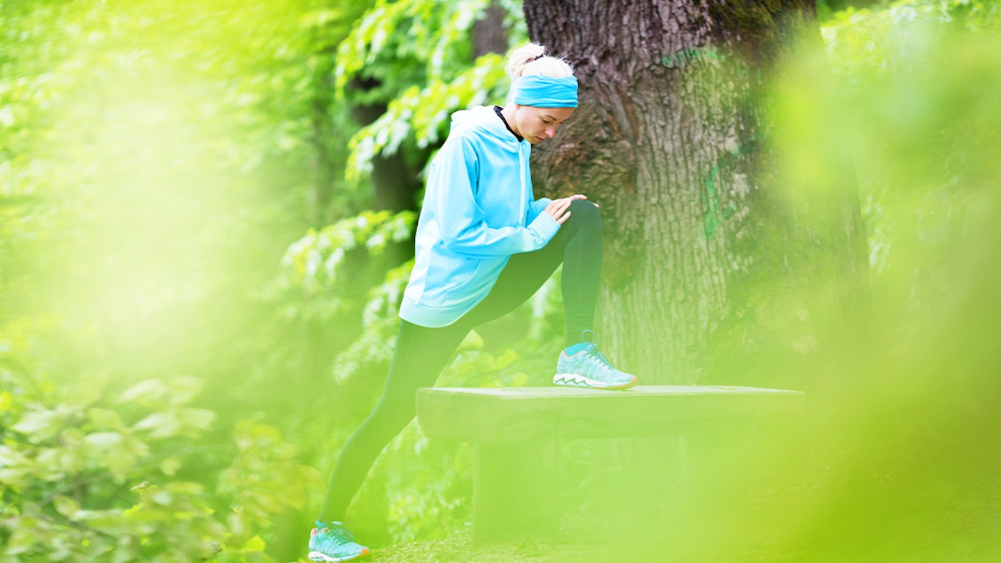 owman stretches in a forest