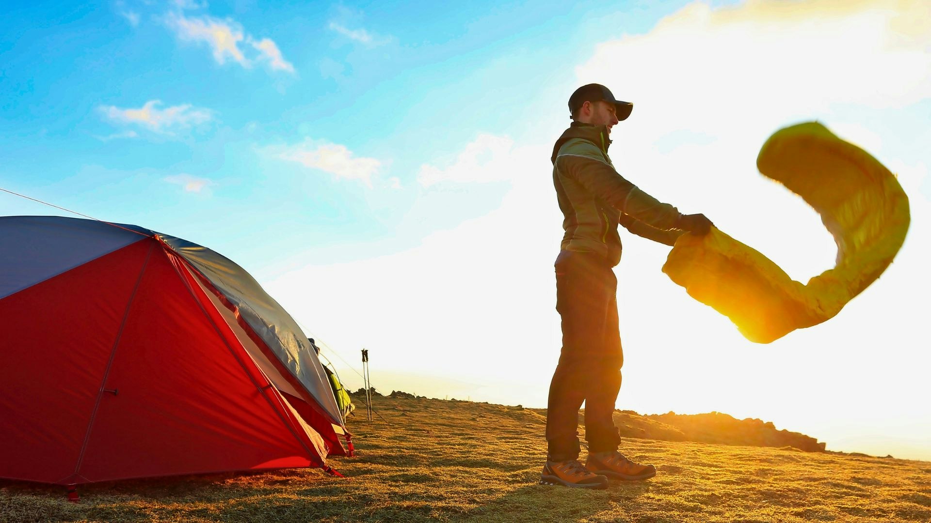 Hiker airing out a winter sleeping bag