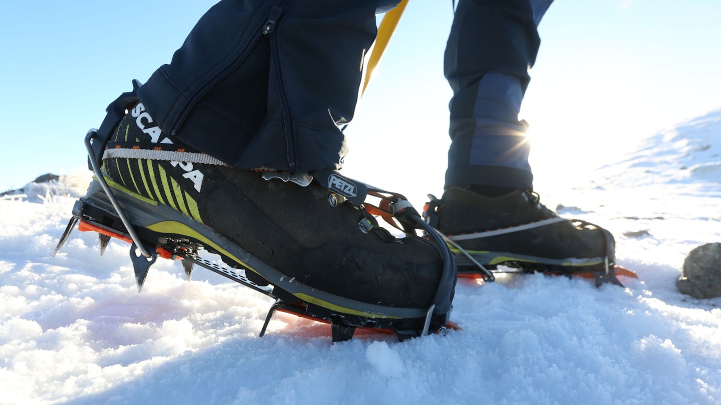 Winter hiking boots with crampons