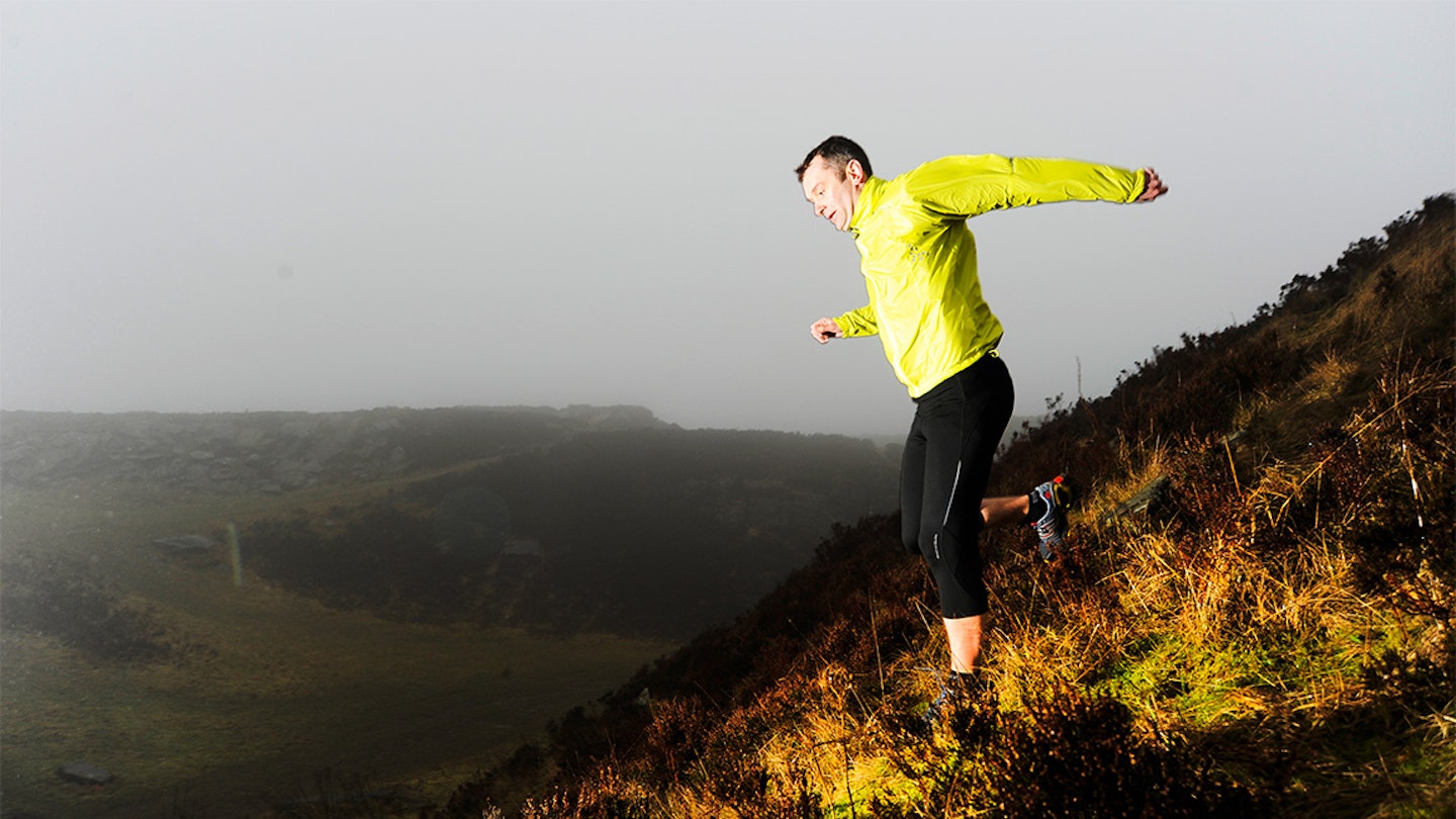 runner runs downhill