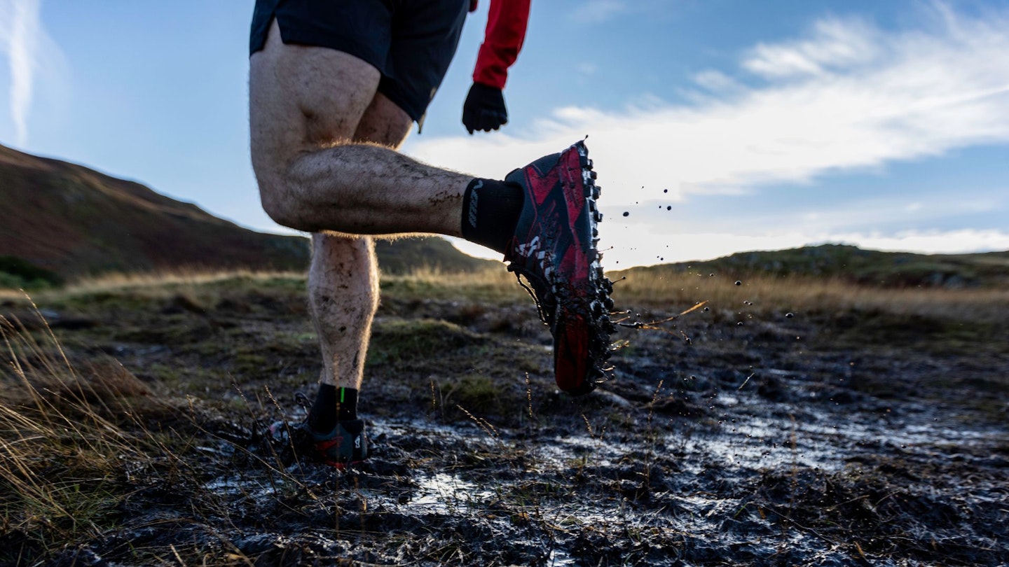 man running in Inov-8 X-Talon Ultra 260 V2