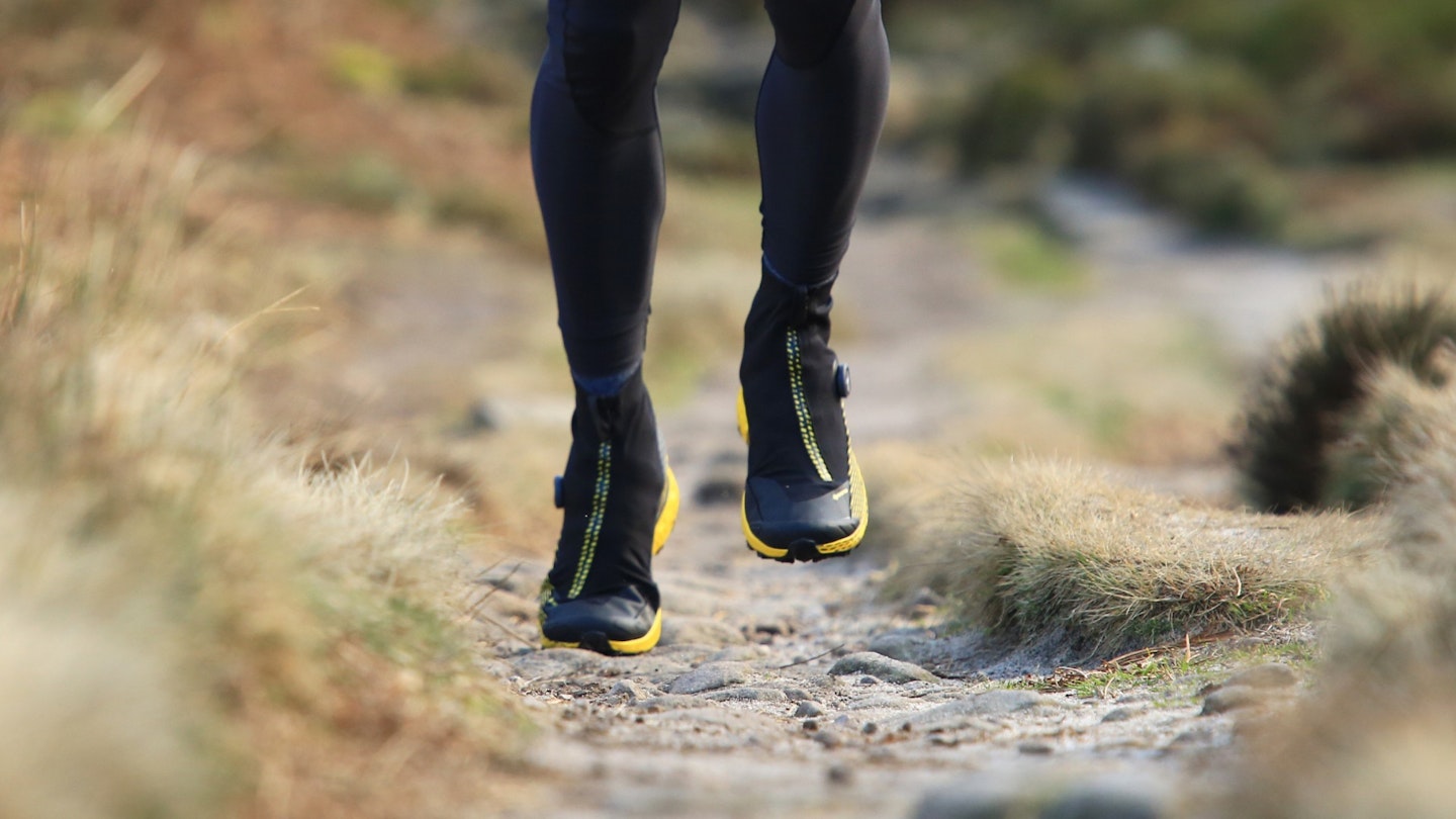 Running along a path wearing La Sportiva Cyklon Cross GTX