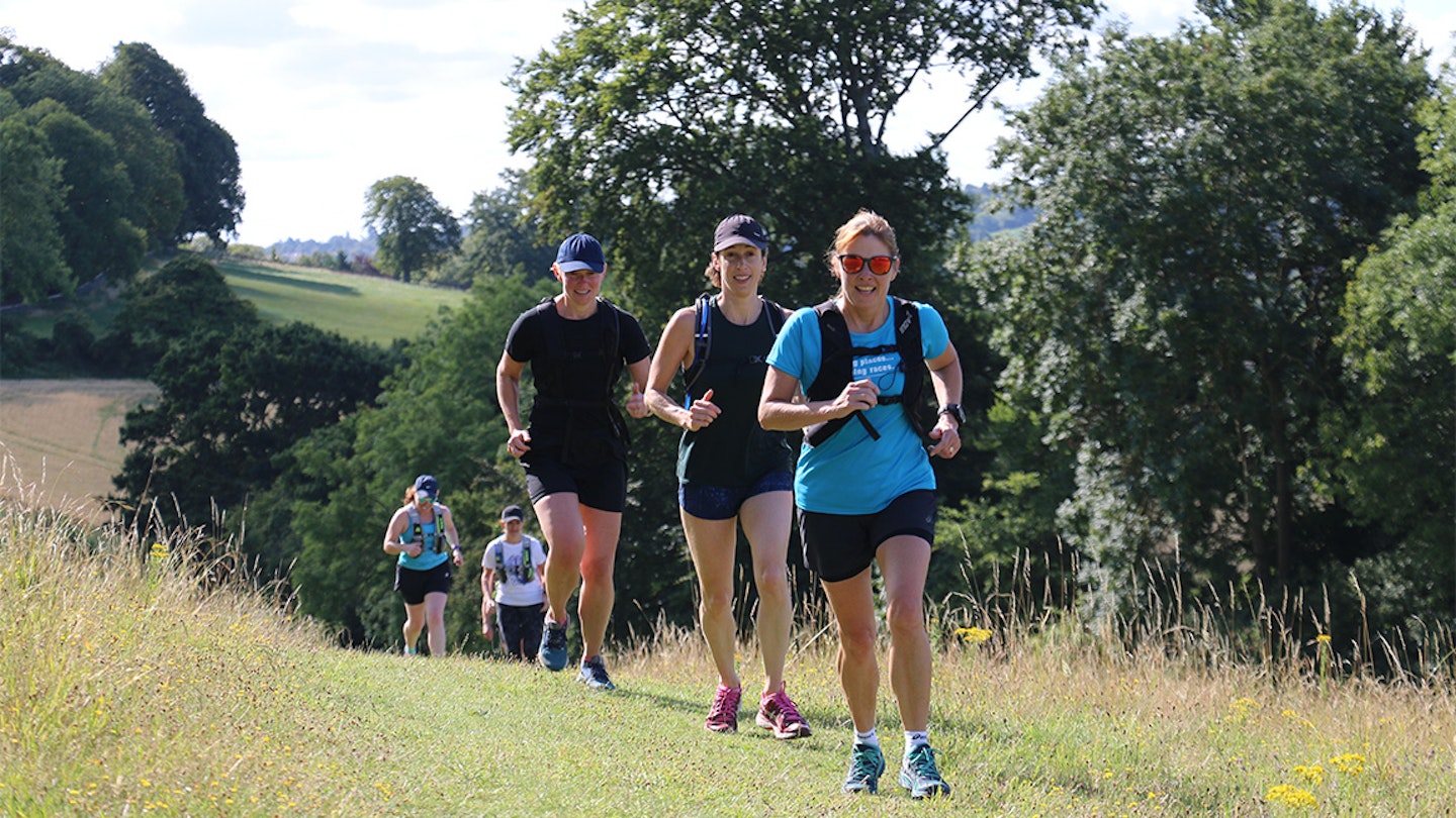 group of runners in a field