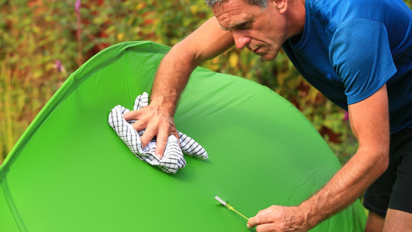 Tom dries the outside of the tent