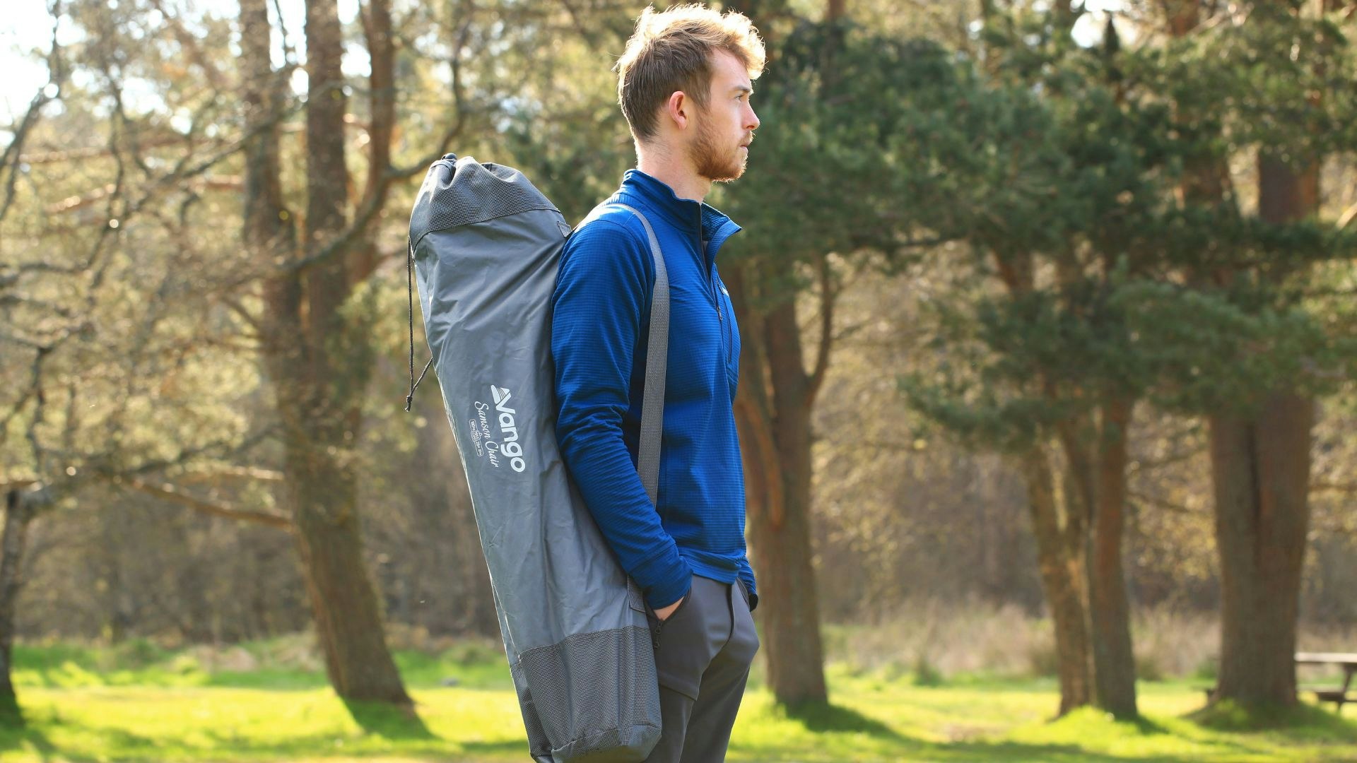 LFTO tester carrying a folded camping chair in its carry bag