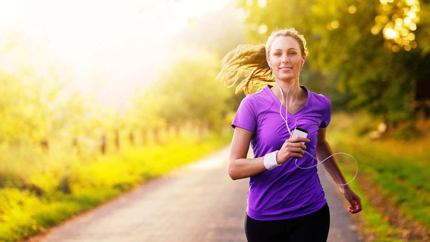 woman runs with music