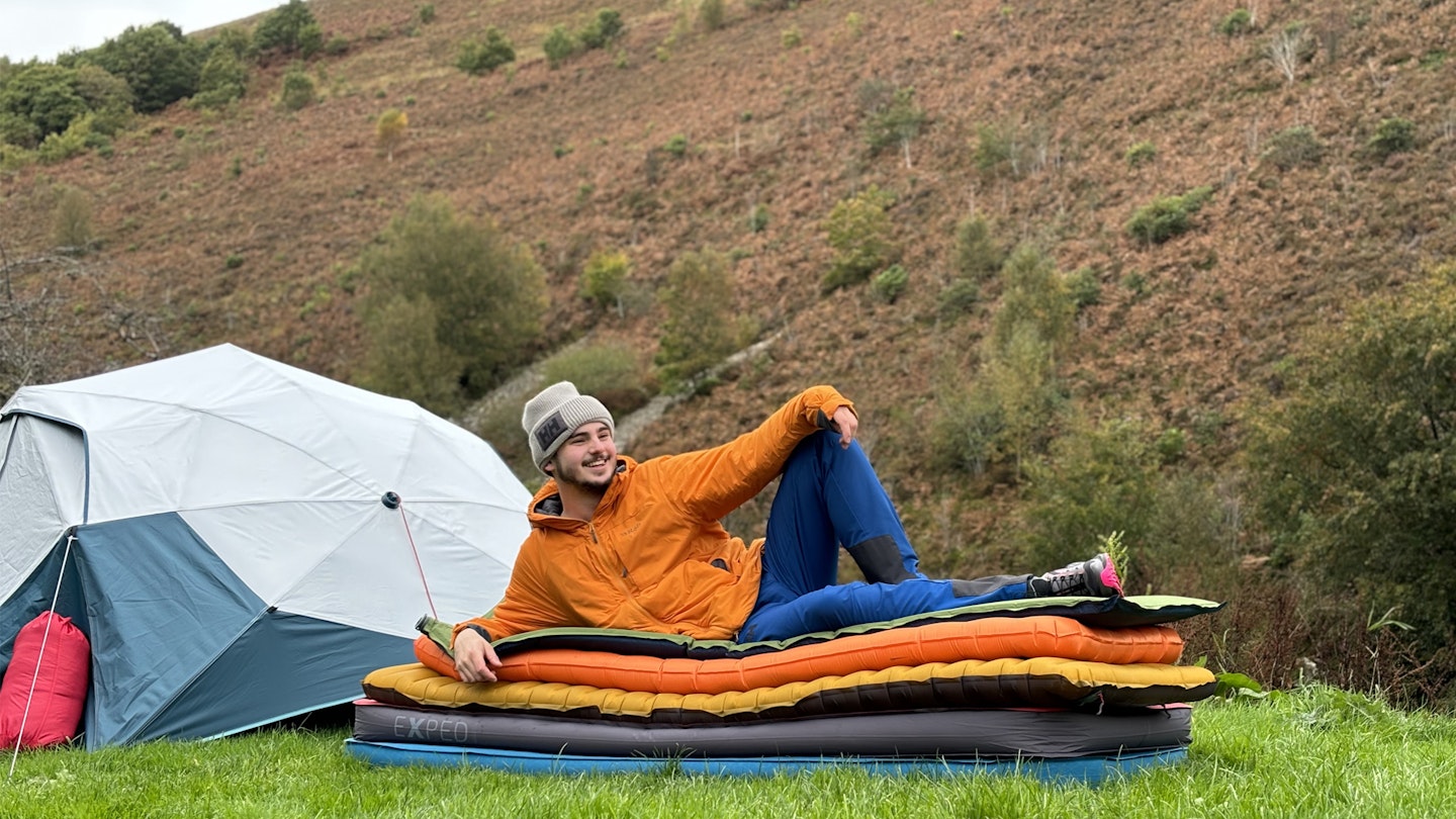 Milo testing camping airbeds at cloud farm campsite in exmoor