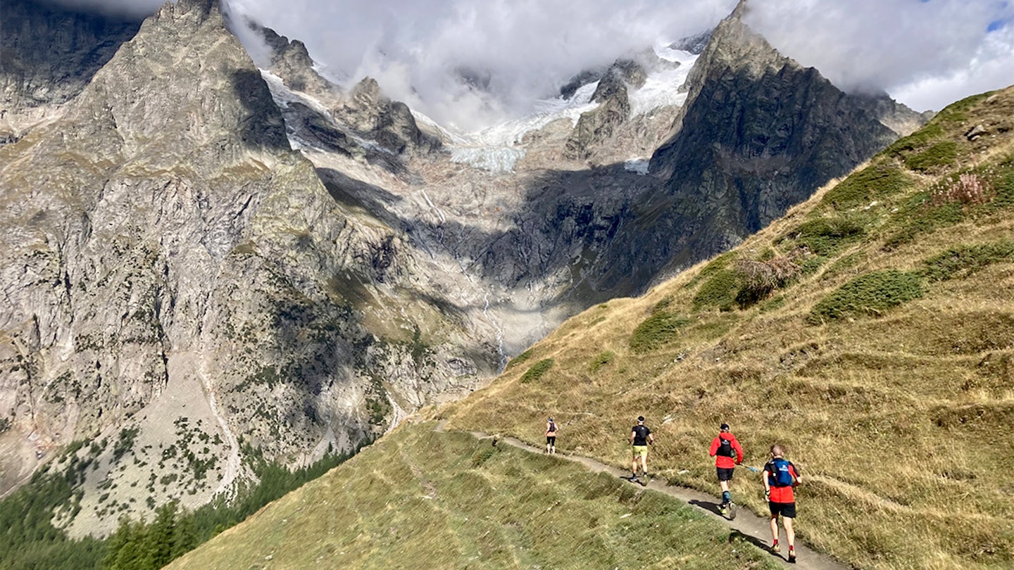 runners in the alps