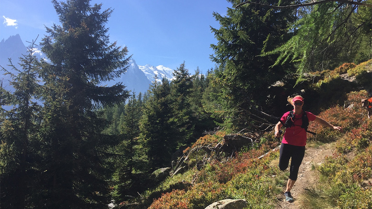 woman running in the alps