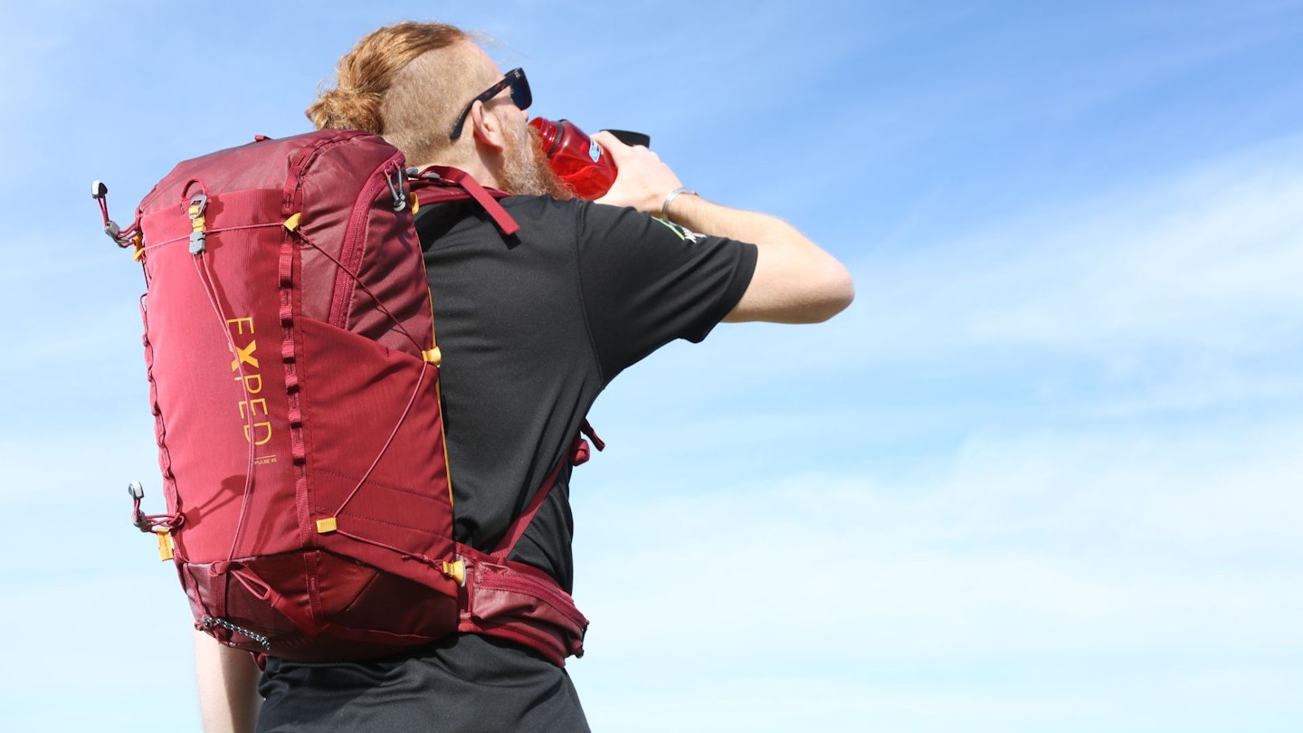 Hiker wearing a red daypack
