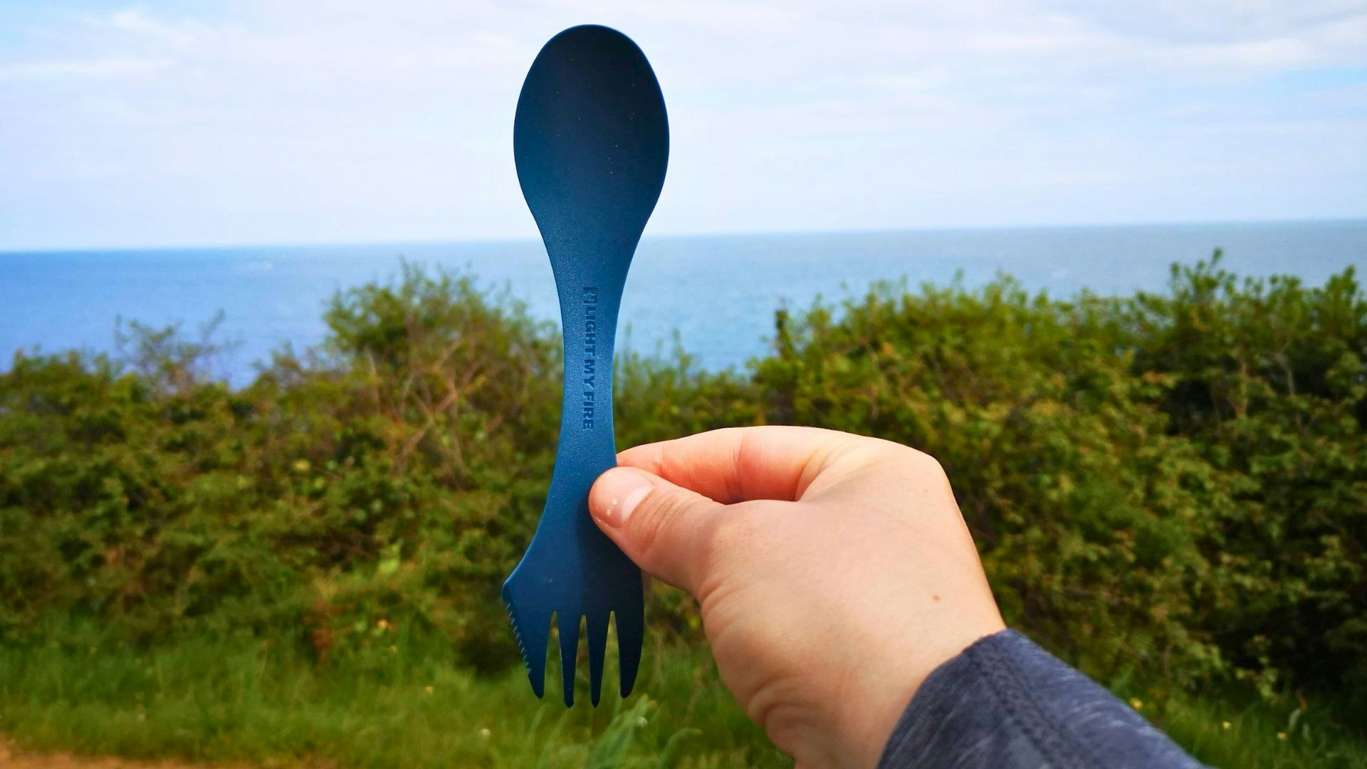 spork against a coastal background
