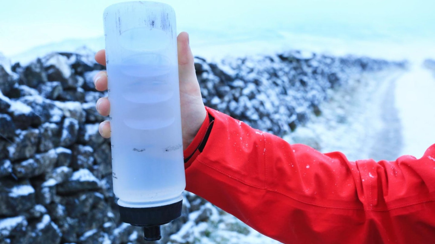 Frozen water bottle while out hiking