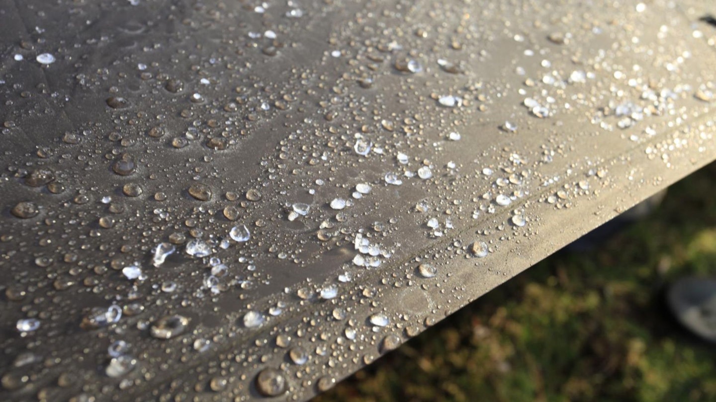 Water droplets on a camping tarp