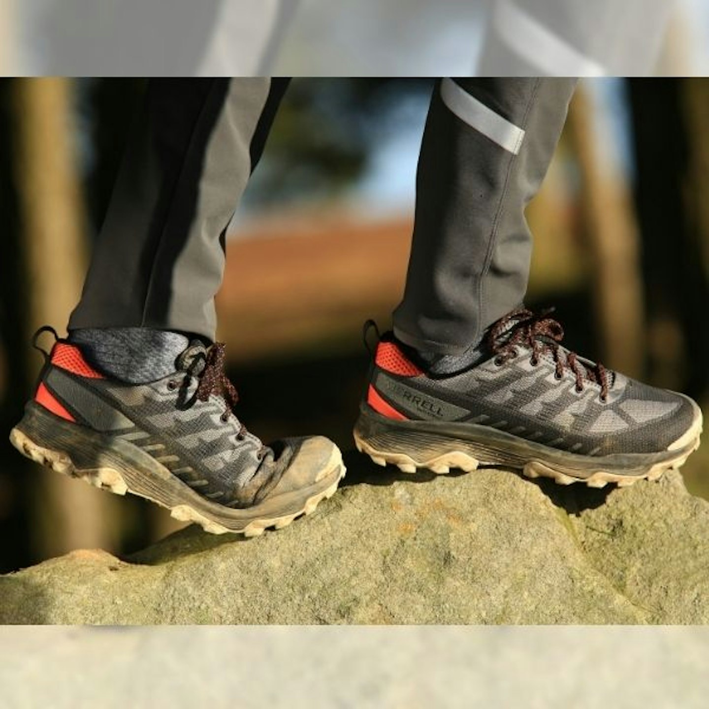 Standing on a rock wearing Merrell Speed Eco 