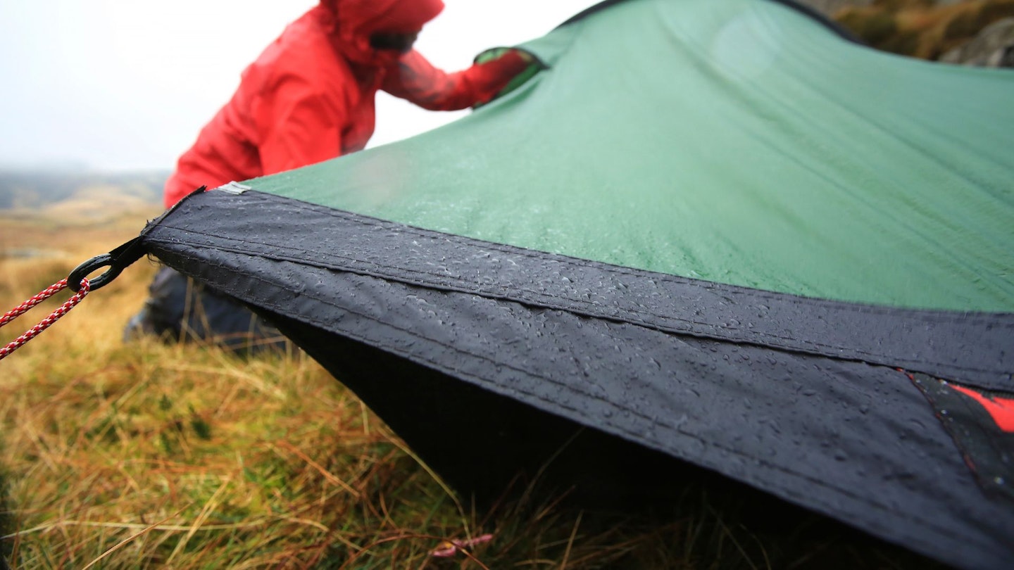 Pitching a tent in the rain