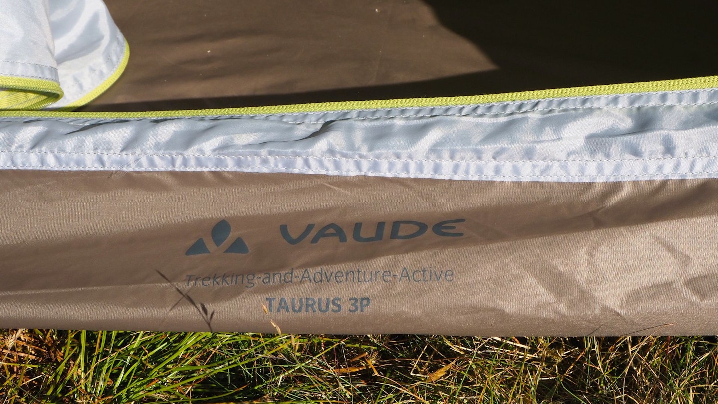 Name printed on the floor of the tent