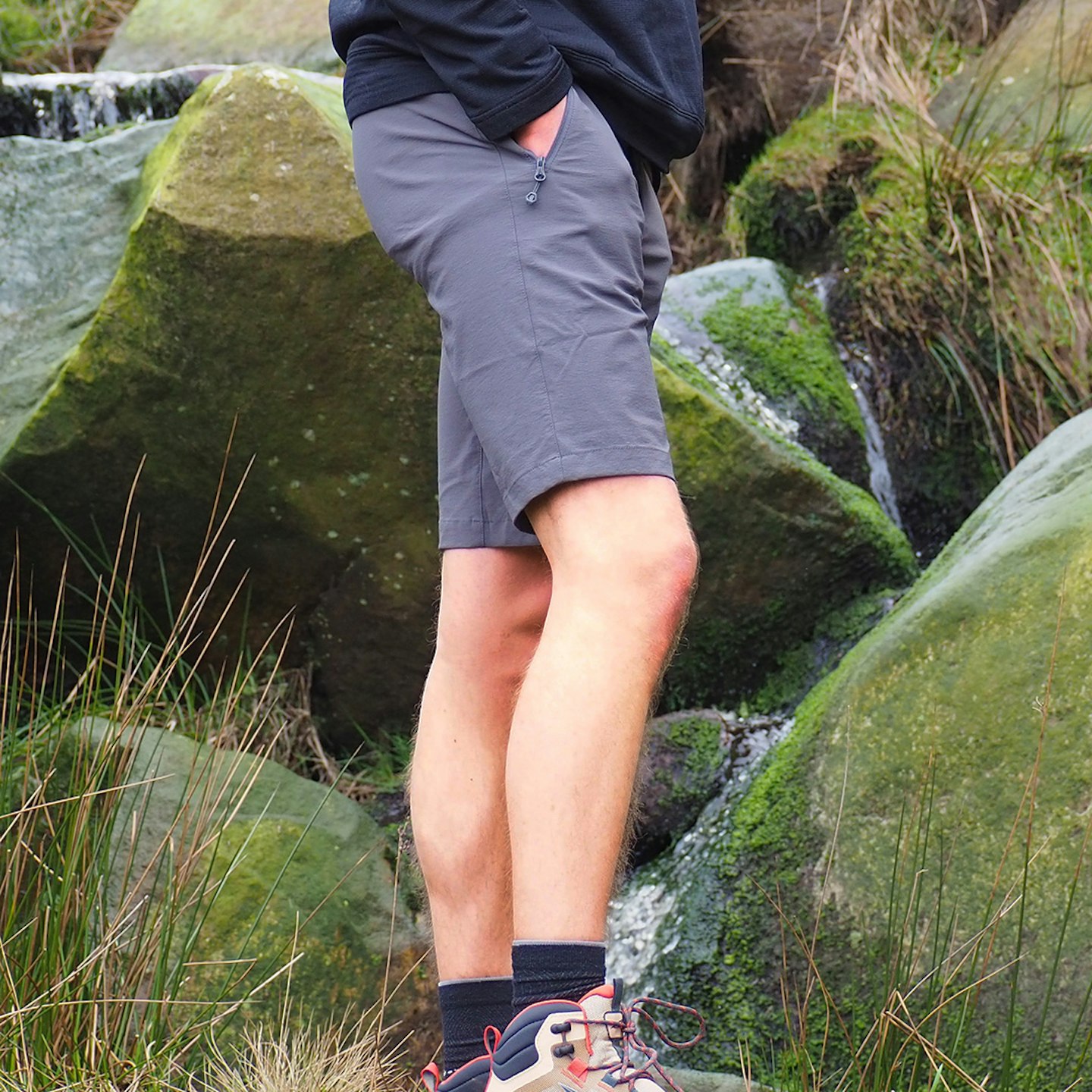 Side view of hiker wearing Montane Dynamic Lite Shorts