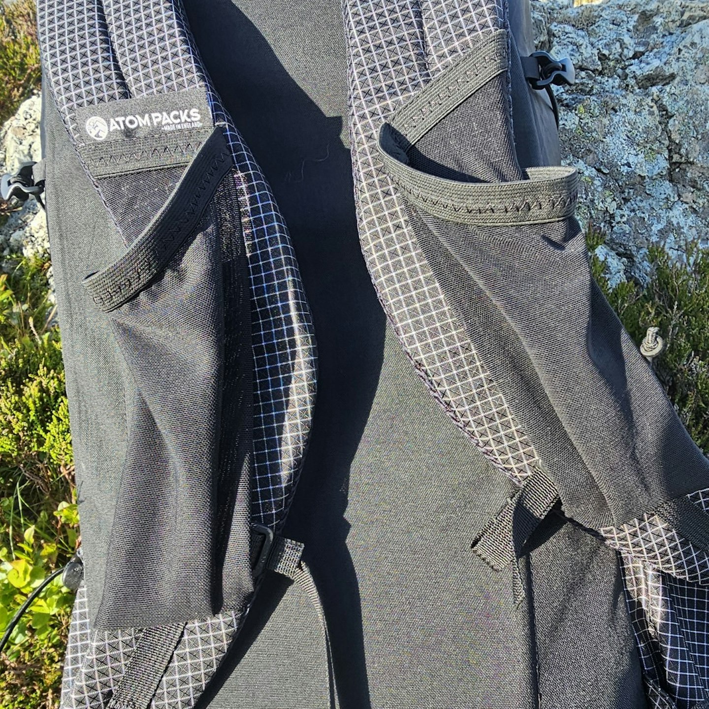 Atom+ EP50 shoulder straps and pockets