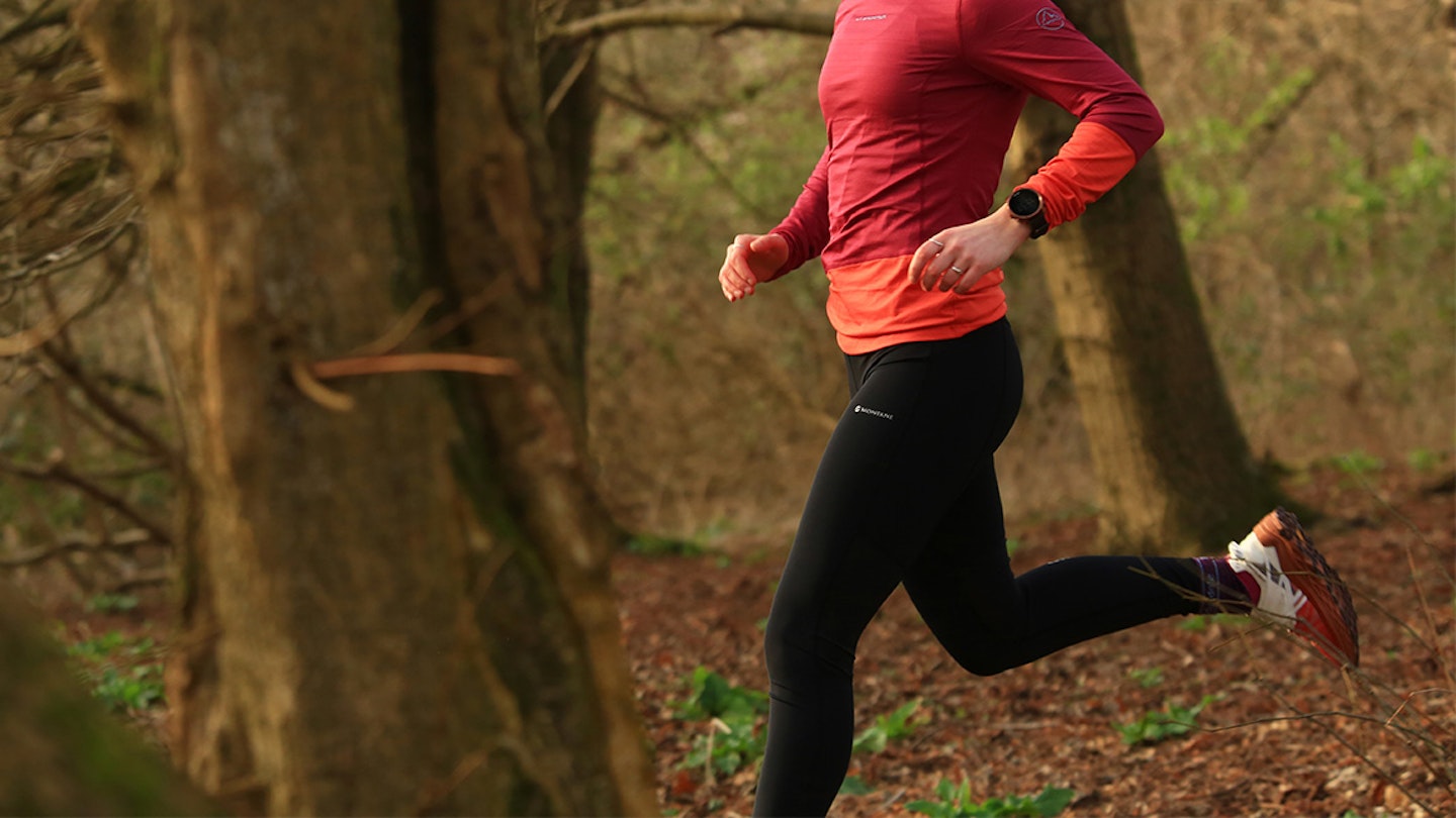 woman running in the forest