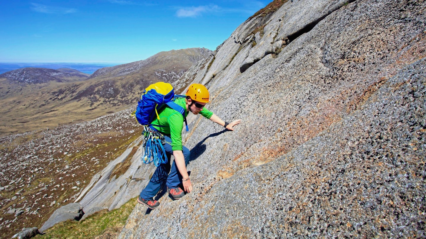 Scrambling with rope and helmet