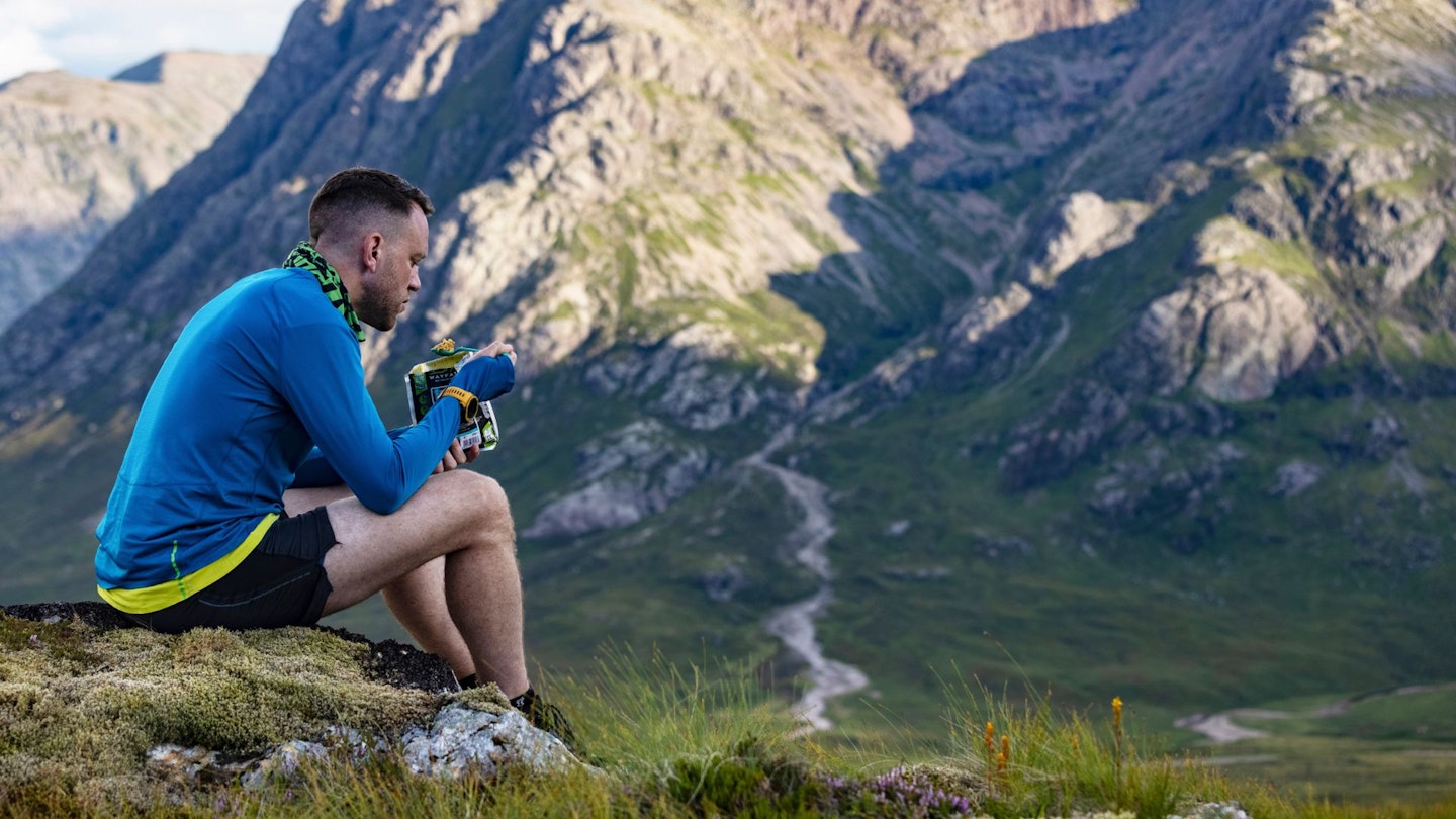 Our ultralight backpacker eating a packet meal