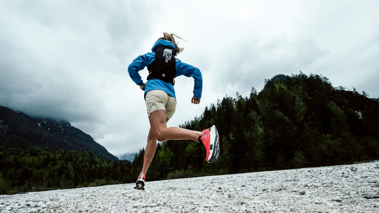 Ida running in the north face summit series clothing line