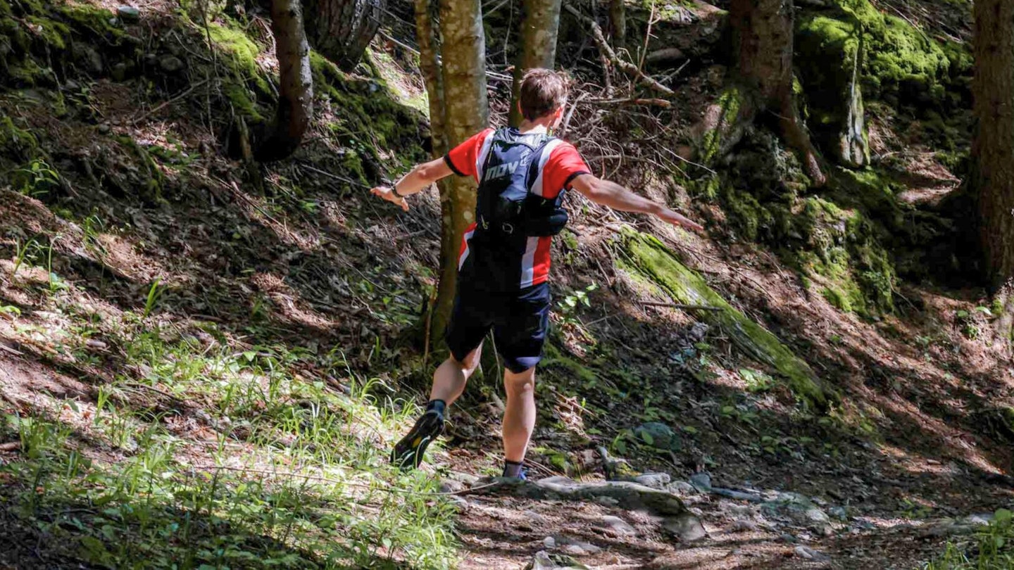 Trail runner going downhill