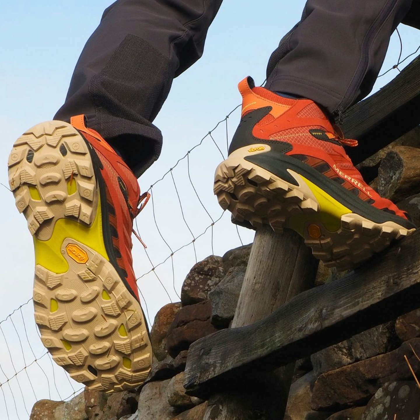 Climbing over a stile wearing Merrell Moab Speed 2 Mid GTX