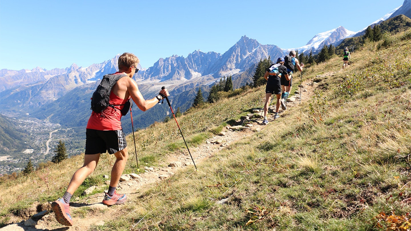 running with poles in the alps